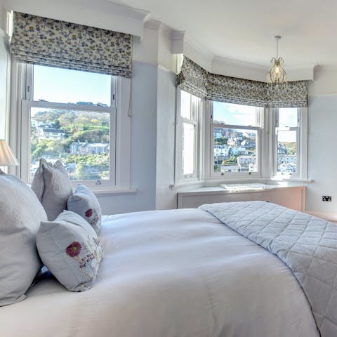 Wake up to sunlight streaming through the windows – the second bedroom has river views