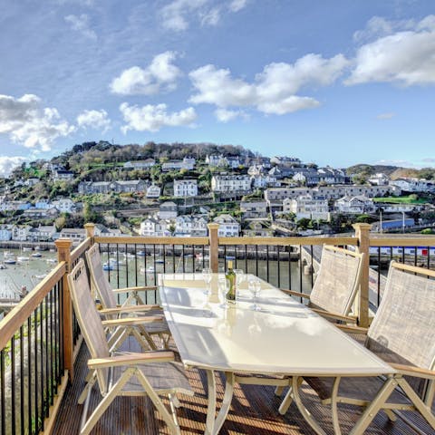 Watch the boats bob in the river on the deck – it's a sweet spot to savour your morning coffee