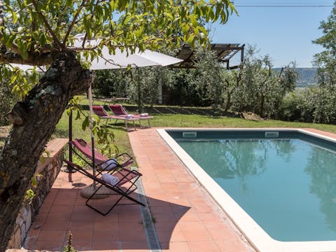 Cool off from the Tuscan heat with a dip in the swimming pool