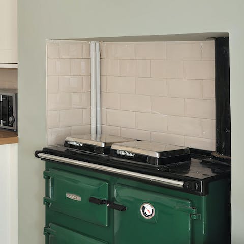 Cook up a storm on the traditional Rayburn stove in the kitchen