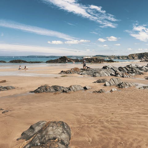 Relax on the golden sands of Fistral Beach, a twelve-minute walk away
