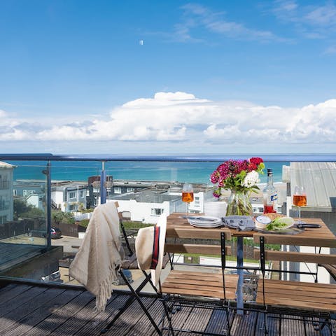 Dine alfresco and admire spectacular sea views on the terrace