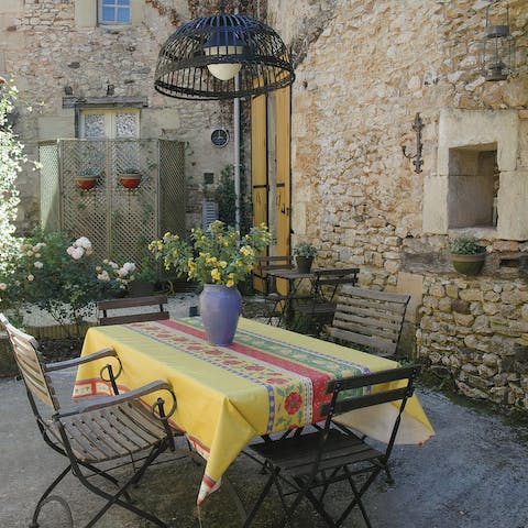 Drink or dine alfresco in the rose-filled courtyard