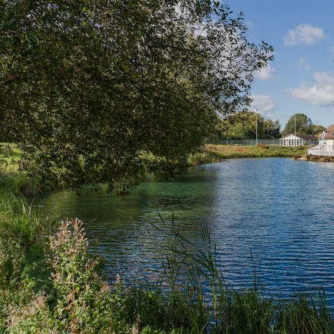 Take in the views of Isis Lake from the deck, the perfect spot to savour a glass of wine in the sun