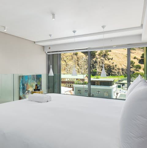 Wake up after a restful sleep in your king-size bed to a peaceful view of the hills
