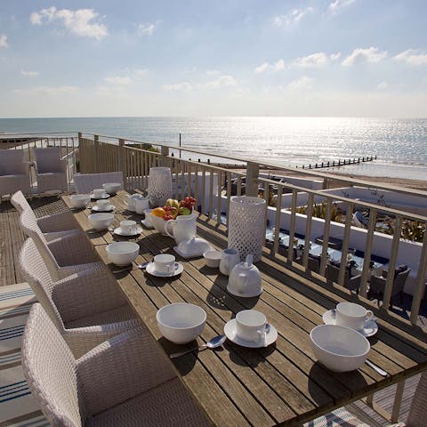 Enjoy breakfast on the balcony overlooking the sea