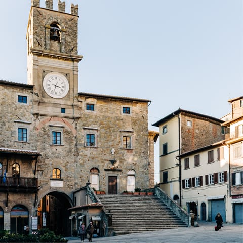 Visit Piazza della Repubblica, a one-minute walk away