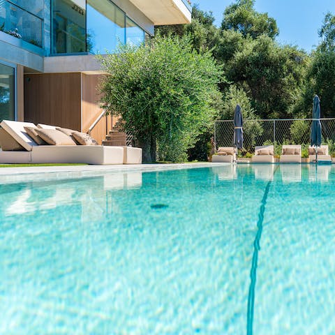 Sink into the cool waters of the private pool and soak up the sun