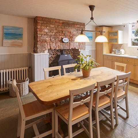 Tuck into hearty English fare around your stylish farmhouse-style dining table