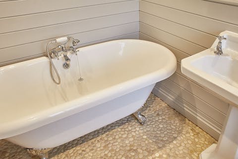 Relax with a long soak in your freestanding bath tub
