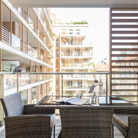 Sip sundowners on your private balcony overlooking a quiet courtyard 