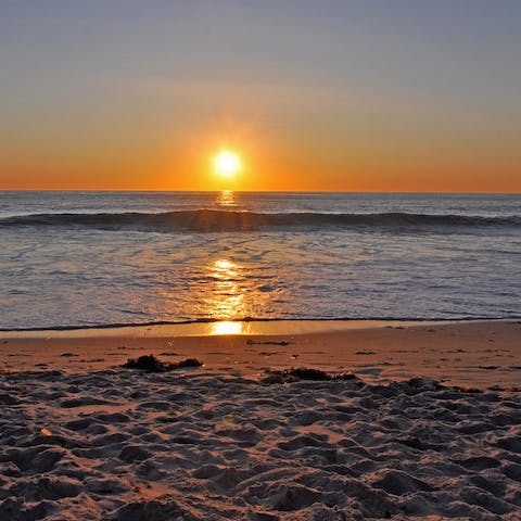 Watch the sunset from South Mission Beach, only a seven-minute walk