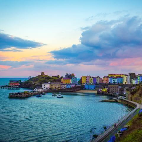 Stay in the heart of Tenby, right across the street from North Beach