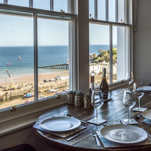 Watch the tide roll in as you enjoy family meals around the dining table