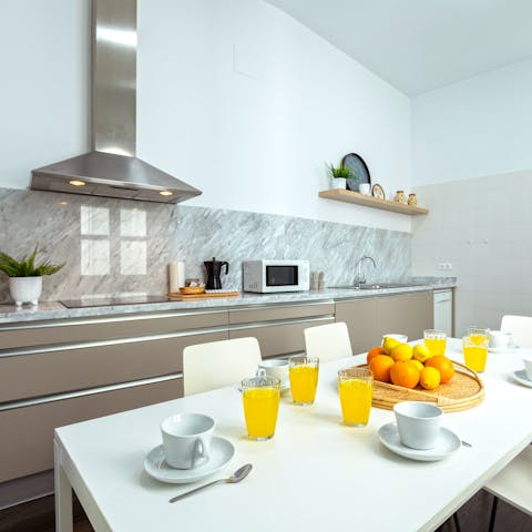 Begin your mornings in this polished kitchen, with a cup of Nespresso coffee