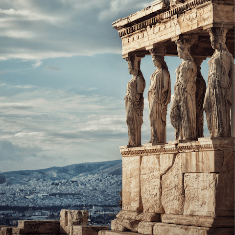 Bask in the beauty of ancient Acropolis, just a fifteen–minute walk away