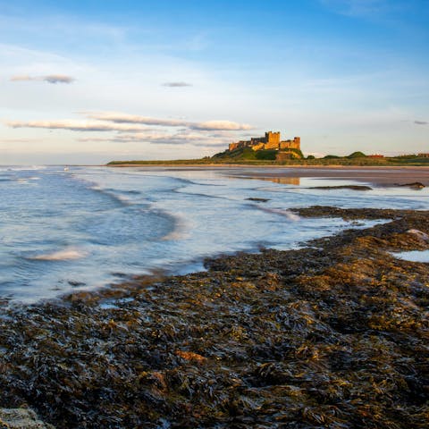 Make the ten-minute drive to Bamburgh for a beautiful beachside castle