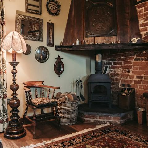 Cosy up on cooler evenings in front of the traditional log burner fire 