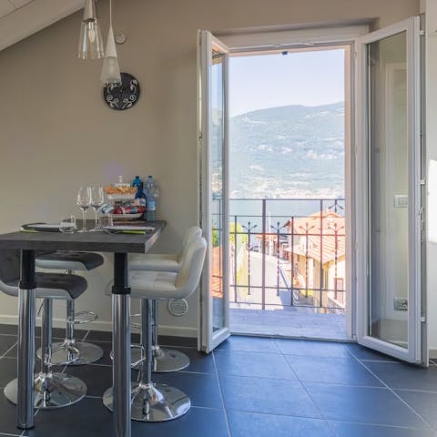 Take in picturesque views over the lake from your private balcony