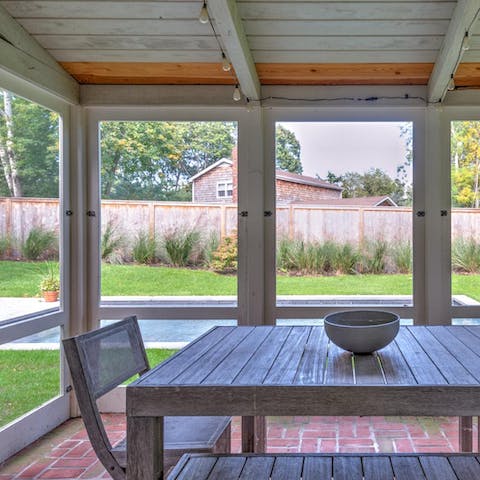 Enjoy your morning cuppa on the screened-in porch and watch the sunrise