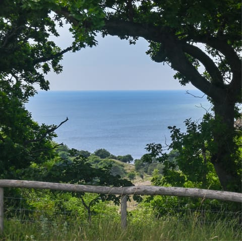 Immerse yourself in the outstanding natural beauty of Bornholm, with your nearest sandy beach a five-minute walk away