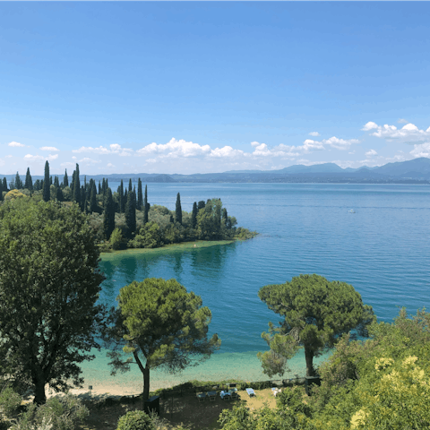Hop on the nearby ferry to fully appreciate the beauty of Lake Garda