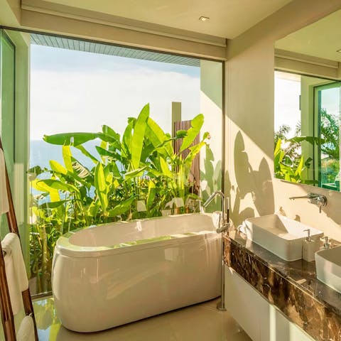 Bathe amid nature from the spa-like bathrooms