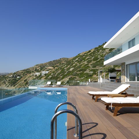 Splash the day away in the pool, admiring the far-reaching views