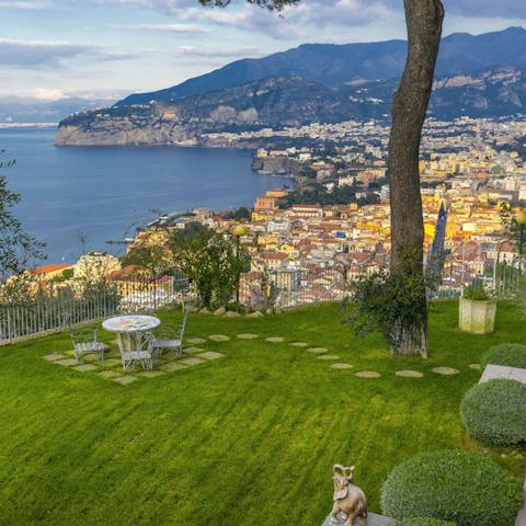 Dine outside in the garden and gaze longingly over the gorgeous view of the Gulf of Naples
