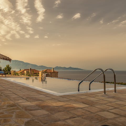 Swim in the private pool as you drink in the Ionian Sea views