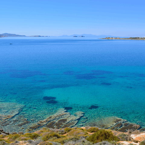 Enjoy stunning panoramic views of the sea between Paros and Naxos