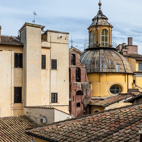 Look out across the Roman rooftops as your sip your morning coffee