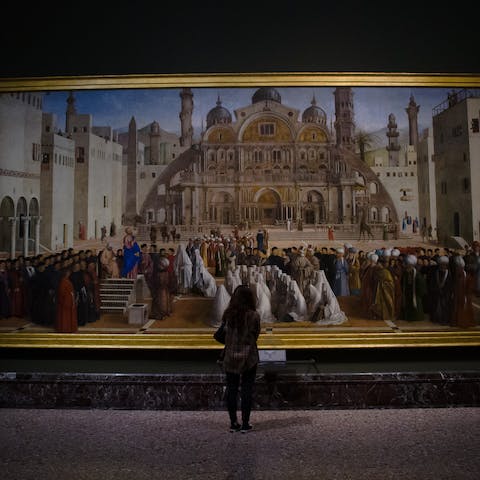 Admire the Renaissance artworks at Pinacoteca di Brera, steps away