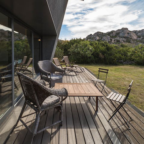 Watch the world go by from your private deck