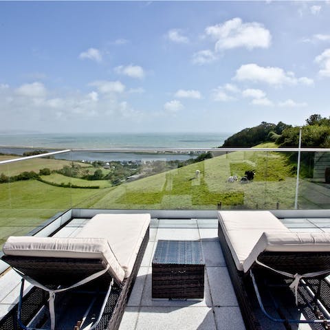 Sun yourself on the balcony loungers