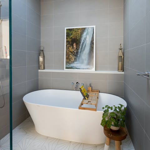 Luxuriate in the spa-like freestanding bathtub in the en-suite