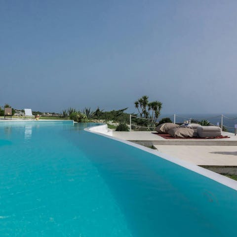 Swim in the private pool to cool off in the Sicilian sun