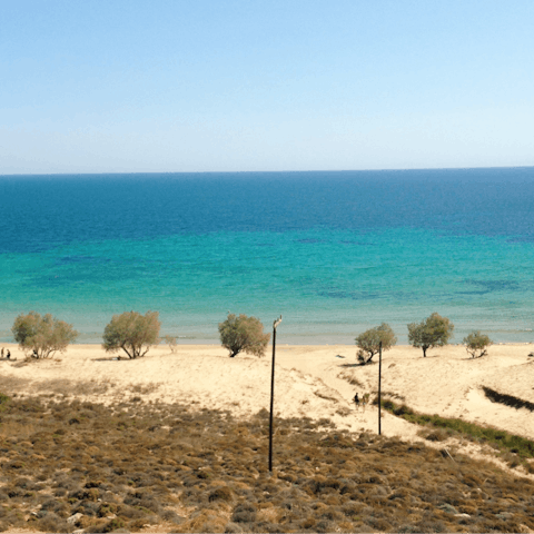 Spend the afternoon at Panormos Bay, just 750 metres away