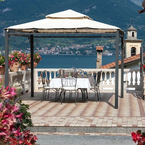Dine alfresco with views out over the lake