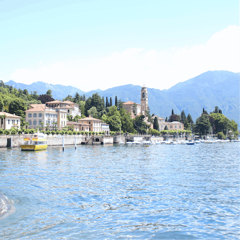 Take a boat ride on Lake Como, soaking up the beauty around you