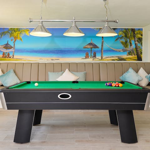 Practice your potting on the pool table in the games room