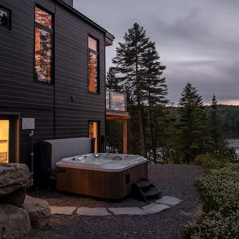 Watch days turn to dusk in the lakeside hot tub