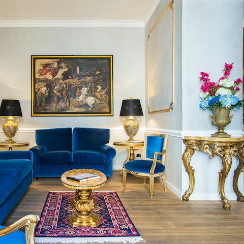 Relax in the sumptuous living space with its French imperial antiques