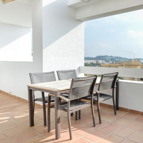 Share an alfresco meal on the covered terrace – you can glimpse the ocean in the distance