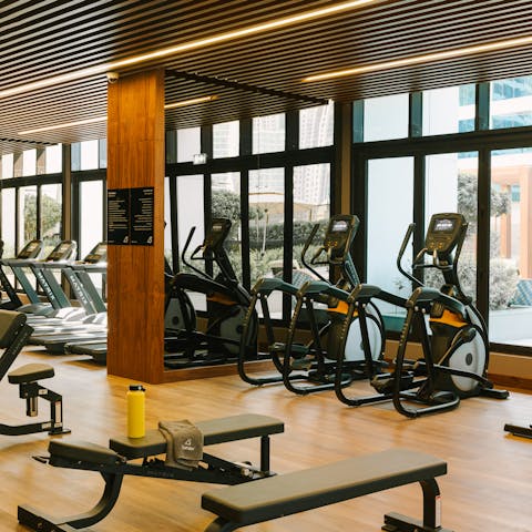 Start the day with an invigorating workout in the building's shared gym