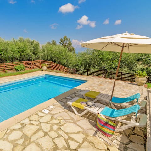 Spend hot afternoons relaxing on a lounger or swimming in the pool
