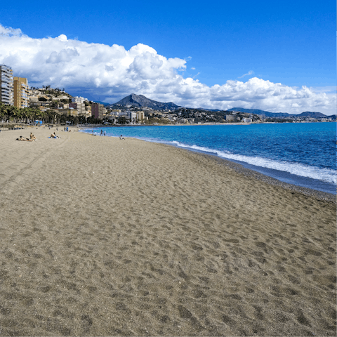 Spend the day at Malaga Beach, within a fifteen–minute drive away