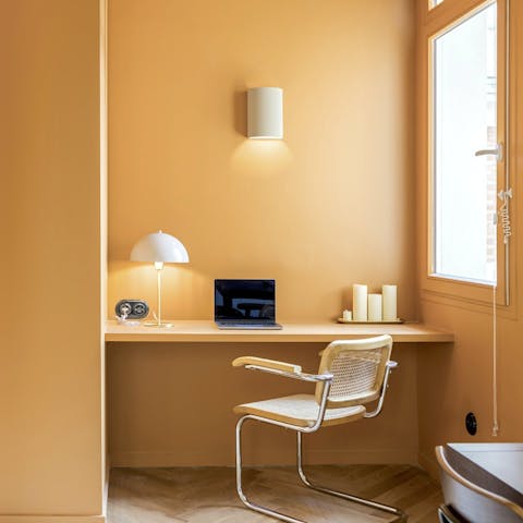 Get down to business in the tangerine-coloured workspace