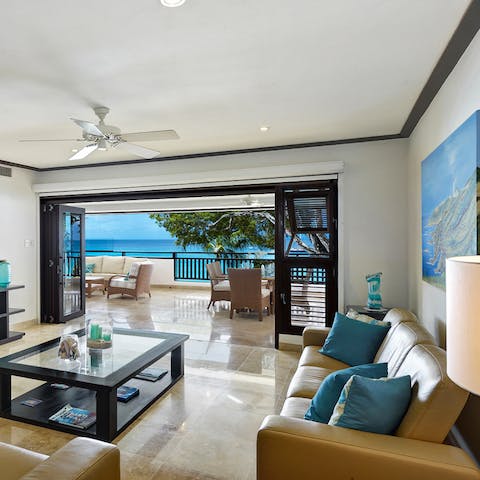 Admire the sea views from the comfort of your stylish lounge
