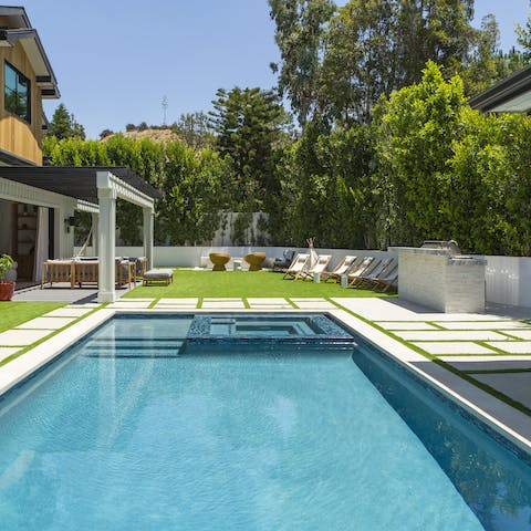 Soak up the LA sunshine from the spa swimming pool